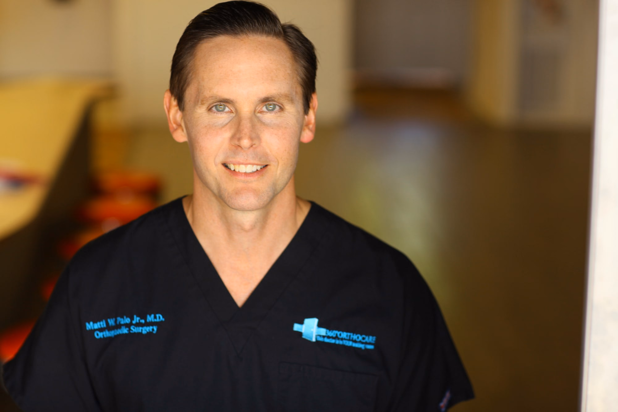 Dr. Matti Palo in orthopedic surgery scrubs